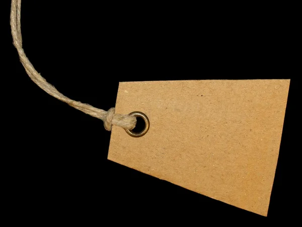 Blank tag tied isolated on black background — Stock Photo, Image