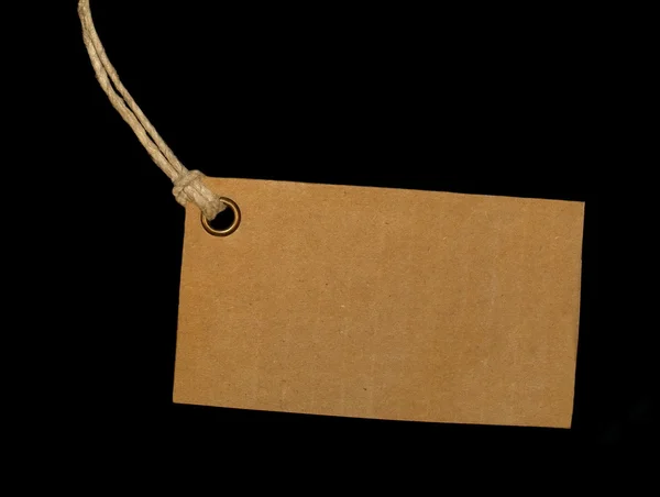 Blank tag tied isolated on black background — Stock Photo, Image