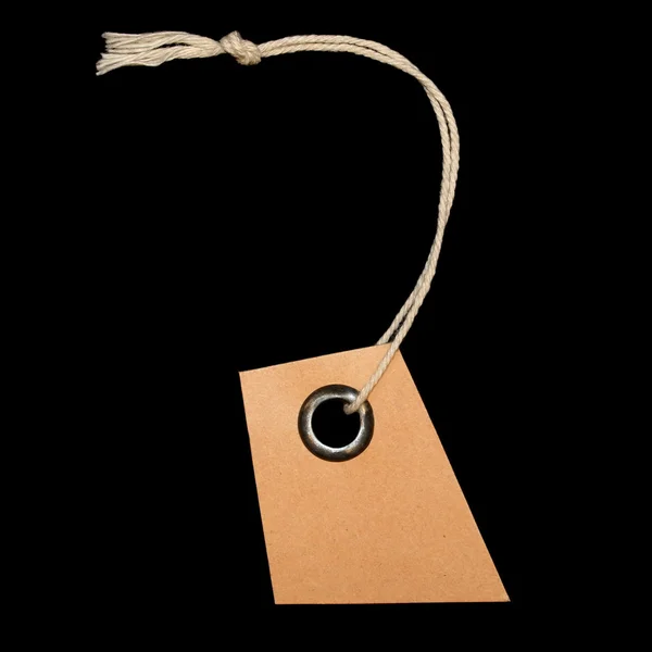 Cardboard blank tag isolated on black background — Stock Photo, Image