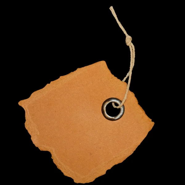 Картонна порожня мітка ізольована на чорному тлі — стокове фото