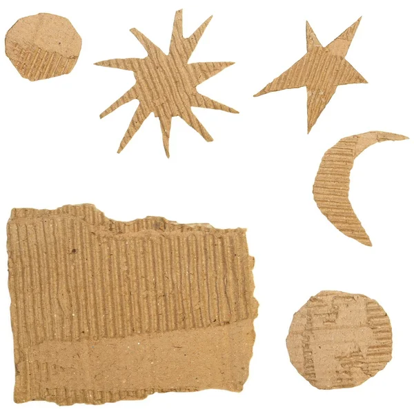 Set Cardboard Scraps isolado no fundo branco (estrelas, lua, sol ) — Fotografia de Stock