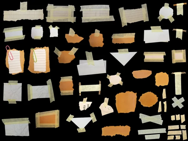 Set paper scraps,cardboard, newspaper and masking tape isolated on black — Stock Photo, Image