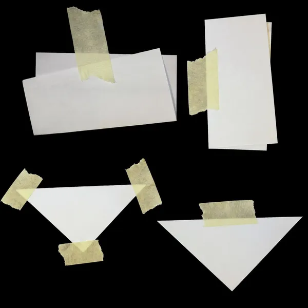 Set old paper scraps and masking tape isolated on black background — Stock Photo, Image