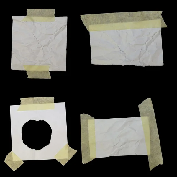 Set de trozos de papel y cinta adhesiva aislados sobre fondo negro — Foto de Stock