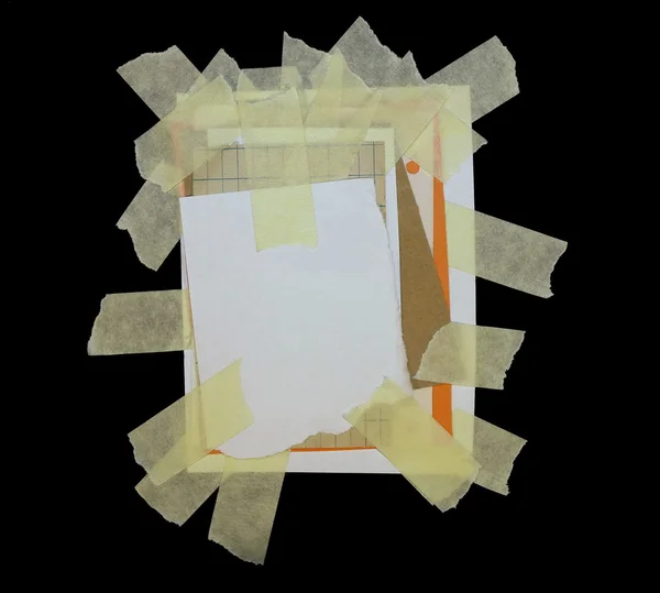 Paper scraps and masking tape isolated on black background — Stock Photo, Image
