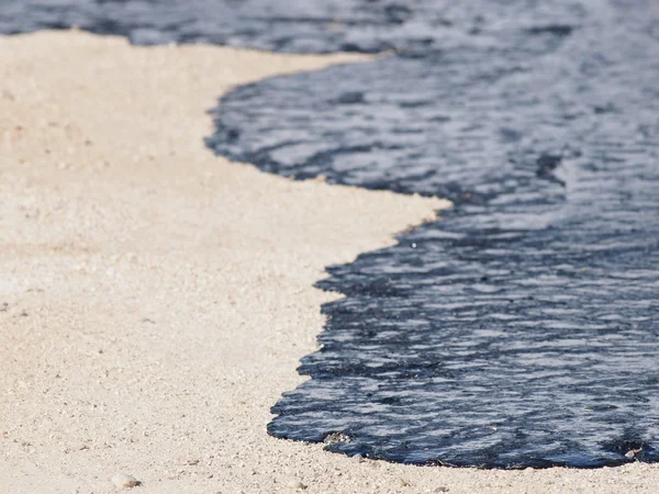 stock image Oil on beach