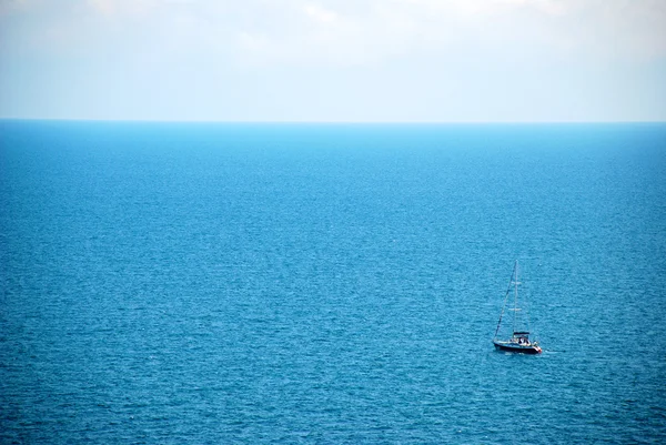 Small boat at sea — Stock Photo, Image