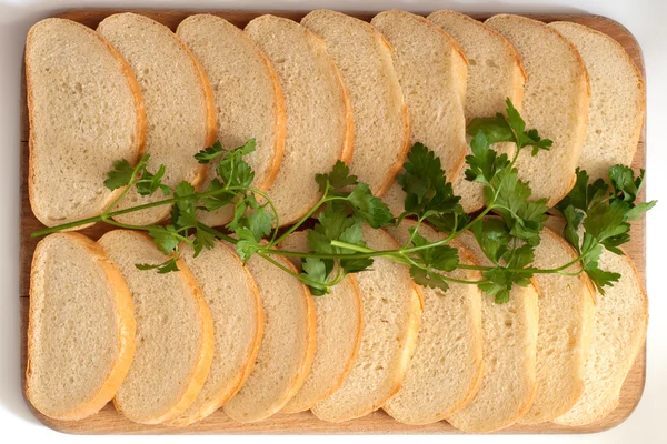 Pão em uma tábua — Fotografia de Stock
