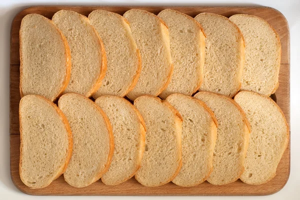 Brot auf einem Brett — Stockfoto