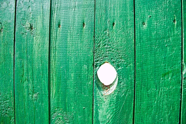 Hål i ett staket — Stockfoto