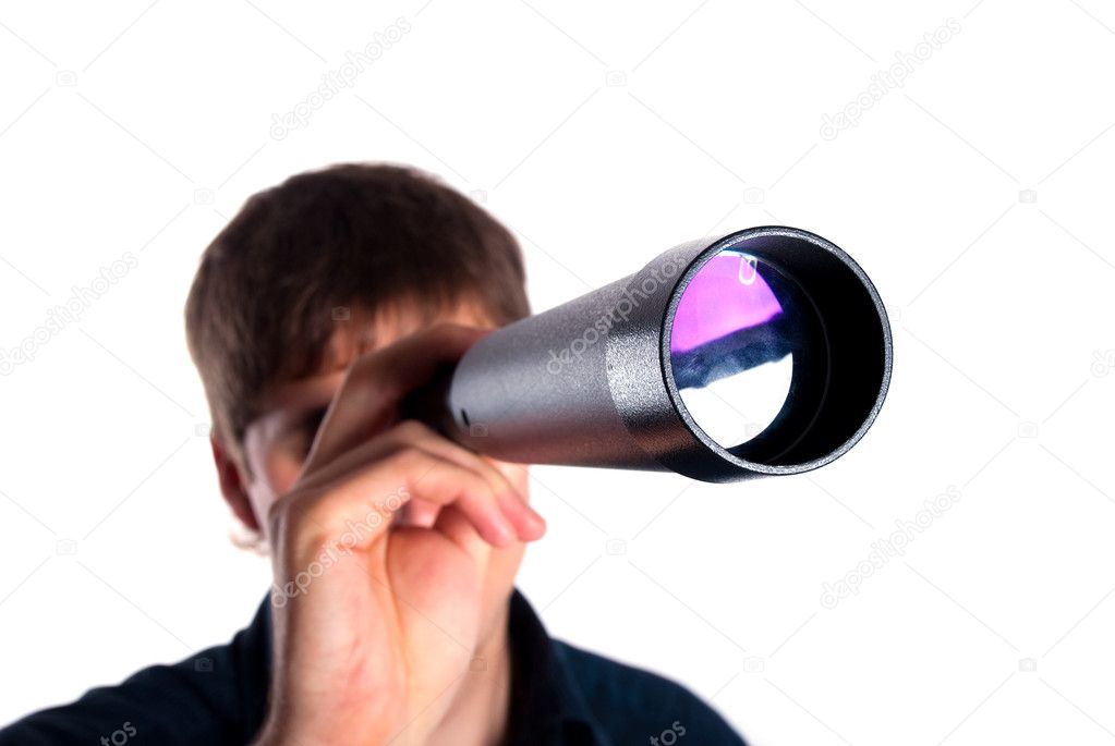 Man looking through a telescope