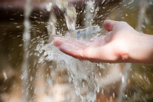 stock image Hand with drops