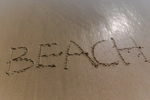 Écrire sur la plage — Photo