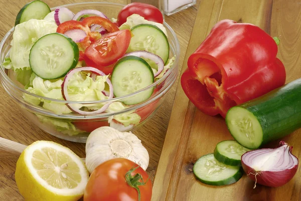 Stock image Composition with vegetable salad bowl and salad ingredients