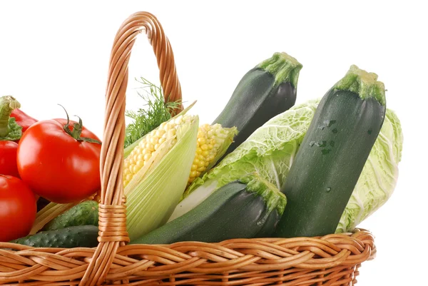 Vegetables and wicker basket — Stock Photo, Image