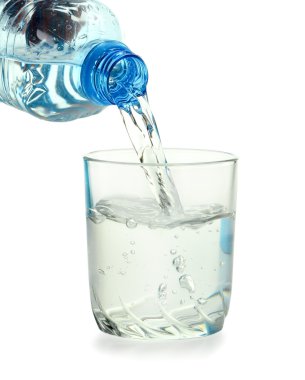 Bottle and glass of water isolated on white clipart