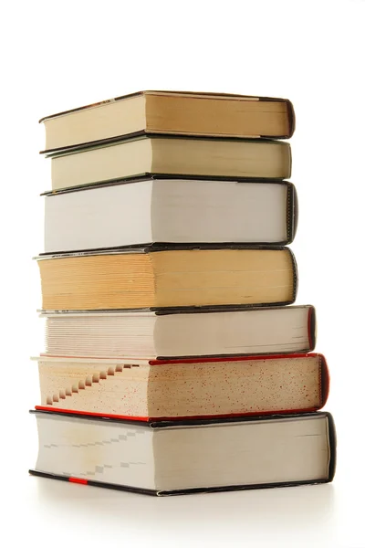 Pila de libros aislados en blanco — Foto de Stock