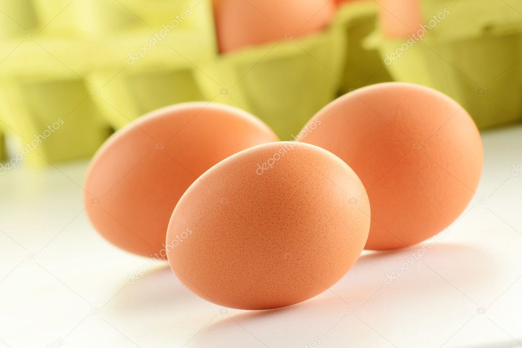 Chicken eggs on kitchen table