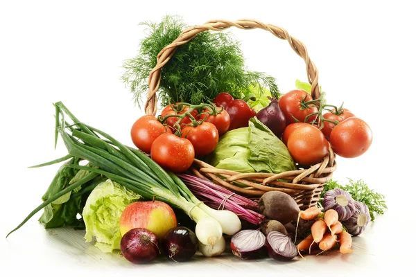 Composition with raw vegetables and wicker basket — Stock Photo, Image