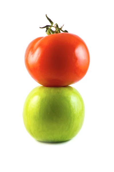 Tomate en la manzana verde —  Fotos de Stock