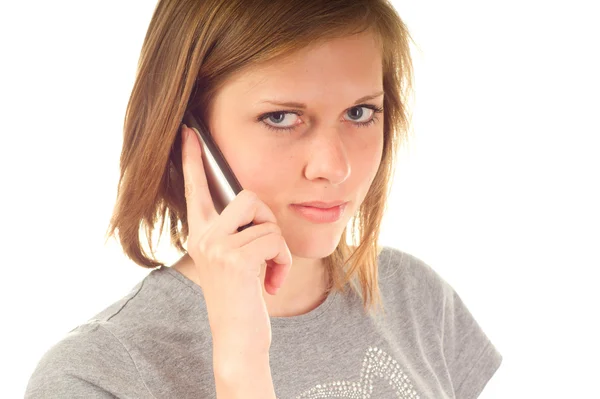 Młoda kobieta korzystająca z telefonu komórkowego — Zdjęcie stockowe