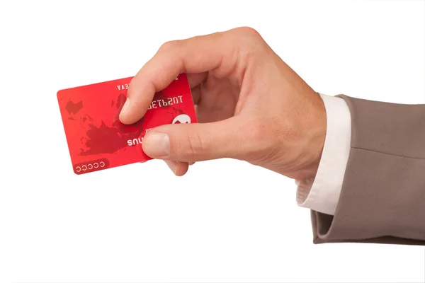 Rode creditcard in de hand Rechtenvrije Stockafbeeldingen