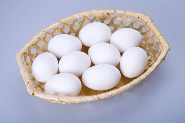 Nine eggs in a basket — Stock Photo, Image