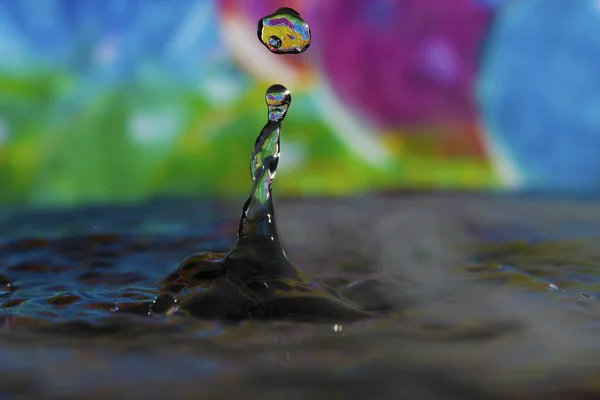 Woda kolorowy kropla rzeźby — Zdjęcie stockowe