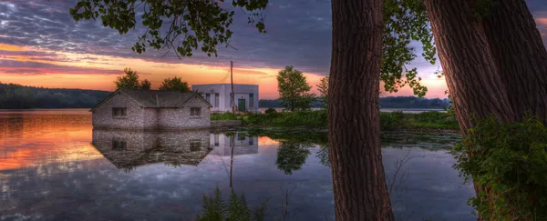 Sunrise panorama of a pump house utility building — Stock Photo, Image