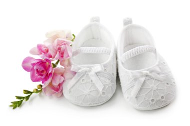 Baby girl shoes with pink flowers clipart