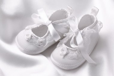 White baby booties clipart