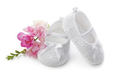 Baby girl shoes with pink flowers clipart