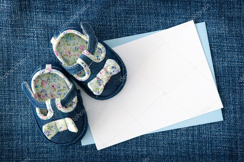 Baby shoes and blank note