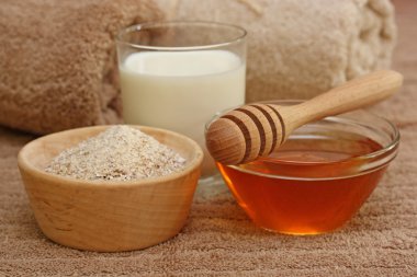 Oatmeal, milk and honey spa clipart