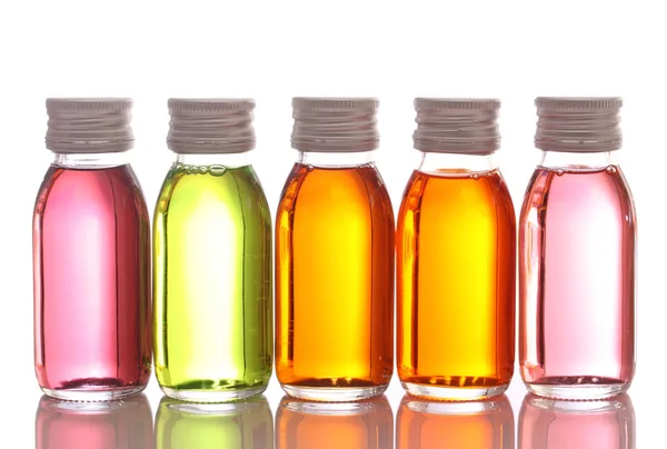 Пляшки з ефірними оліями — стокове фото