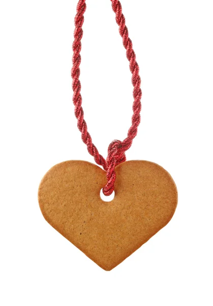 Zencefil Ekmek kalp ve kırmızı kurdele — Stok fotoğraf