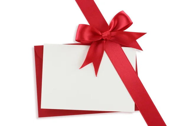 Diagonal rote Geschenkschleife und Blanko-Karte — Stockfoto