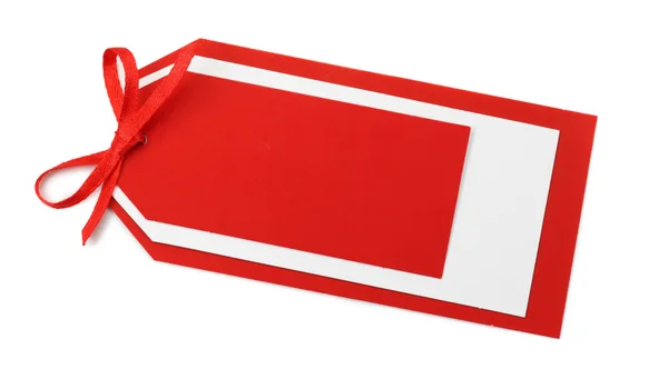 Etiqueta vermelha em branco com arco — Fotografia de Stock