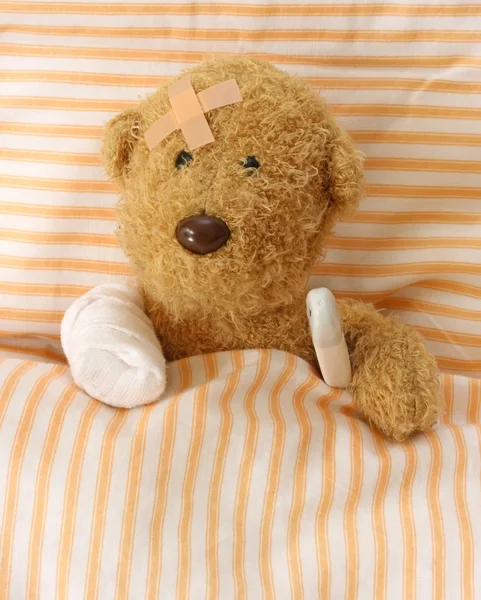 Teddy bear ill Stock Image