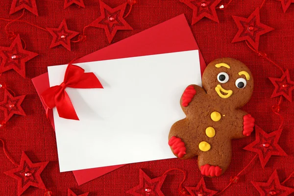 Gingerbread man and blank card — Stock Photo, Image