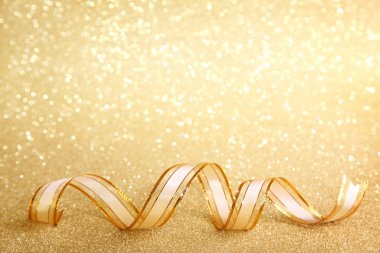 Golden festive background clipart