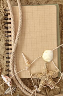 Exercise book and seashell clipart