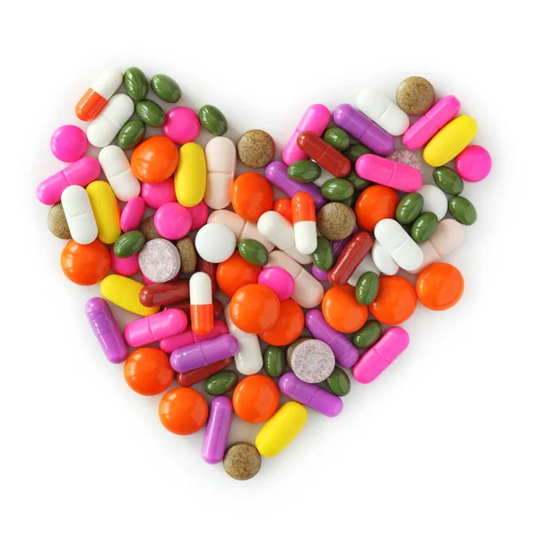 Heart of pills and capsules — Stock Photo, Image
