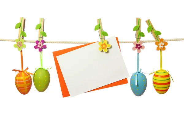 Easter eggs and blank note — Stock Photo, Image