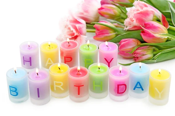 Birthday candles and tulips — Stock Photo, Image