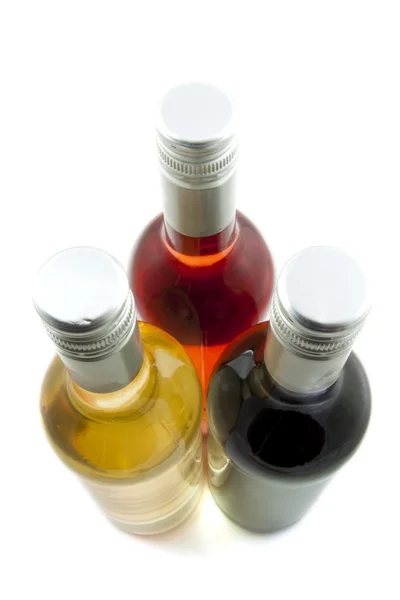 Три бутылки вина — стоковое фото