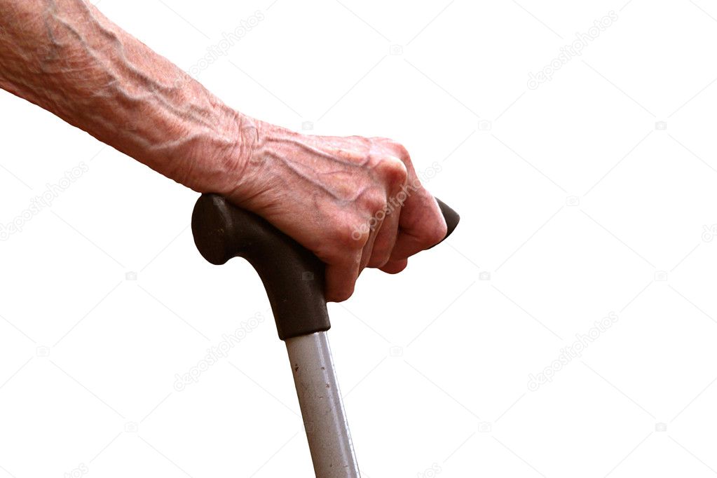 Hand an elderly woman resting on a stick