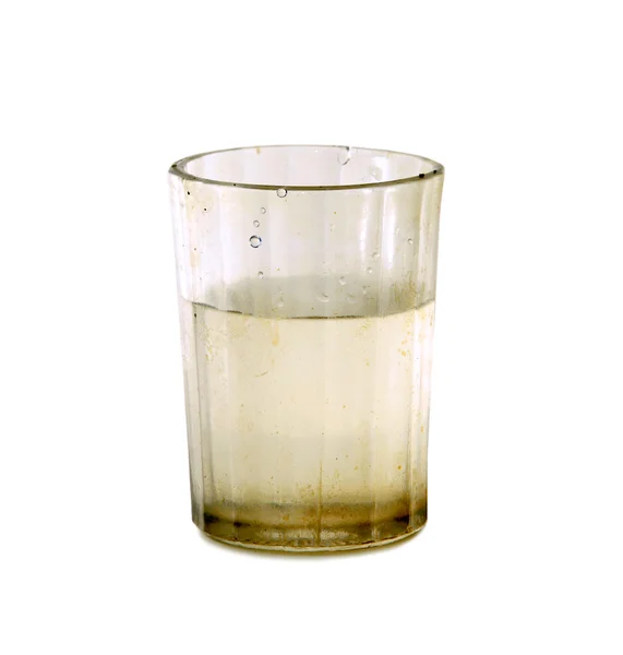 Dirty glass with fresh water — Stock Photo, Image