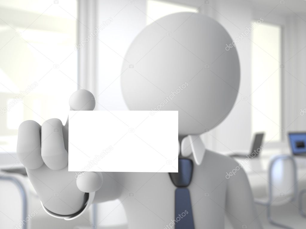 Businessman in office showing a blank business card