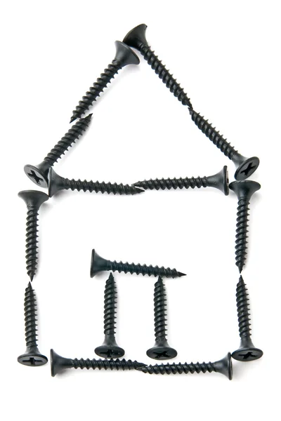 Hus av svarta skruvar — Stockfoto